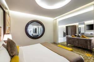 Vuode tai vuoteita majoituspaikassa Ahad Rafidah Garden Millennium Hotel