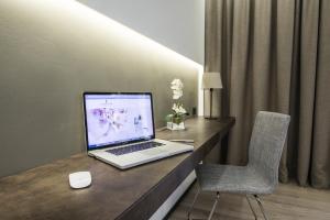 TV a/nebo společenská místnost v ubytování Hotel Des Bains Terme