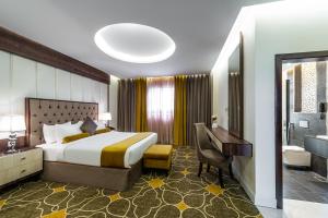 Vuode tai vuoteita majoituspaikassa Ahad Rafidah Garden Millennium Hotel