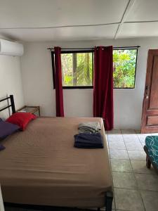 Postel nebo postele na pokoji v ubytování Pura Vida Hostel