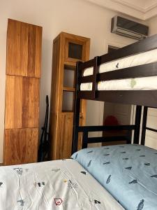 Ένα ή περισσότερα κρεβάτια σε δωμάτιο στο Villa Shemsi piscine privative chauffée