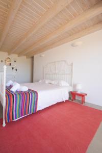 Katil atau katil-katil dalam bilik di Amazigh-Casas de Vale Figueiras