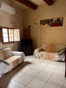 Postel nebo postele na pokoji v ubytování Arkati house