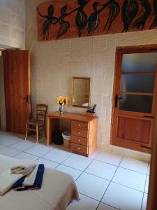 Postel nebo postele na pokoji v ubytování Arkati house