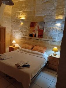 Postel nebo postele na pokoji v ubytování Arkati house