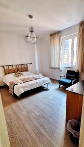 Giường trong phòng chung tại Casa di Giulia