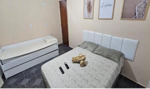 Postel nebo postele na pokoji v ubytování House Beach Brasil