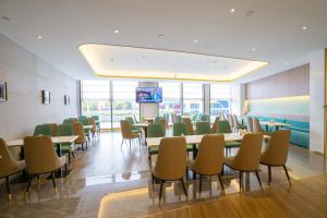 Sjónvarps- og/eða afþreyingartæki á Baolong Homelike Hotel Shanghai - Ma An Shan Branch