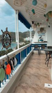 Balkón nebo terasa v ubytování Aptartamentos Temáticos con balcón panorámico frente a la Playa
