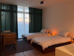 Postel nebo postele na pokoji v ubytování Slowalk + 11 fotografií