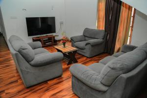 Χώρος καθιστικού στο Cloud 16 Homestay