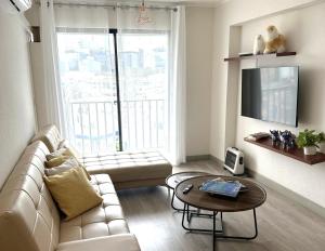 Televisyen dan/atau pusat hiburan di 1Br AC San Isidro Apartment +23 gambar