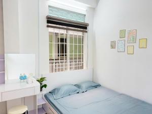 Postel nebo postele na pokoji v ubytování Thai's Homestay