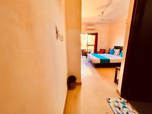 Voodi või voodid majutusasutuse The southern Soul Beach Resort -close to calangute beach Managed By Shivam Resort toas
