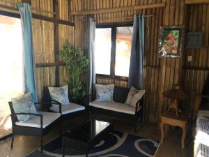 Posezení v ubytování Beach Cabins