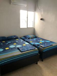 Postel nebo postele na pokoji v ubytování Casa Santorini II