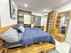 Postel nebo postele na pokoji v ubytování Olu's Condo + 7 fotografií