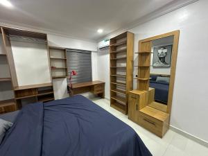 Postel nebo postele na pokoji v ubytování Olu's Condo