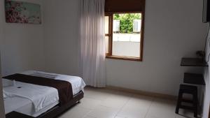 Postel nebo postele na pokoji v ubytování Hotel Tramonti