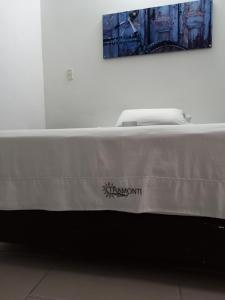 Postel nebo postele na pokoji v ubytování Hotel Tramonti