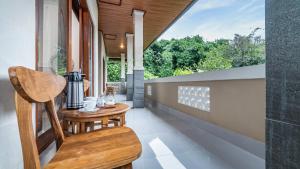 Balkón nebo terasa v ubytování Depi House Ubud