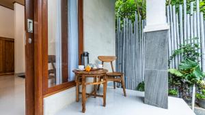 Posezení v ubytování Depi House Ubud + 37 fotografií