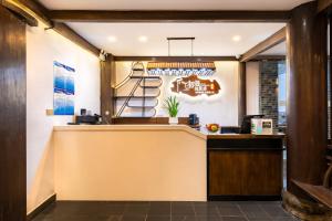 Zona de hol sau recepție la Huangshan Chuyuyuan Manju Homestay