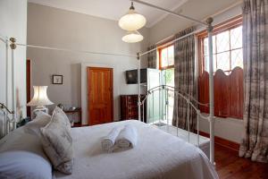 Postel nebo postele na pokoji v ubytování Sundays Karoo Guesthouse