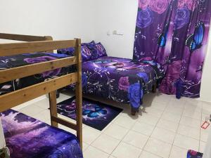 Postel nebo postele na pokoji v ubytování Multiple Holiday Rooms in Port Morant St Thomas Jamaica