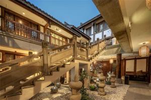 Fotografie z fotogalerie ubytování Chongqing Nanping Wanda Meihua Courtyard v destinaci Čchung-čching