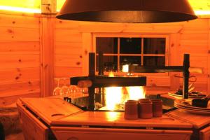Posezení v ubytování Gite Roche Des Ducs avec Piscine toute l'année, Spa, Sauna, Hammam