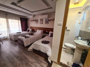 Voodi või voodid majutusasutuse tourist hotel toas