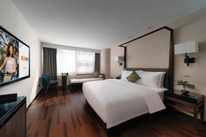 Postel nebo postele na pokoji v ubytování SSAW Hotel (Jiefangbei Hongyadong Branch)