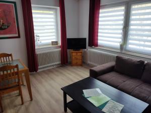 Posezení v ubytování Ferienwohnung Südstrandkrabbe