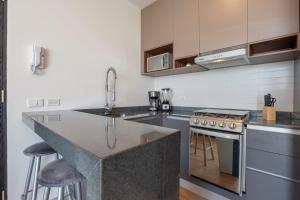 a kitchen with a sink and a counter top at MiLi's home, comodidad y ubicación en Guadalajara in Guadalajara