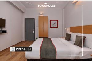 Postel nebo postele na pokoji v ubytování Townhouse Singapore Mall