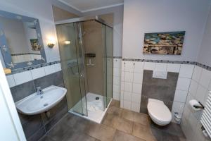 Ein Badezimmer in der Unterkunft Villa Seerose - Appartement 11