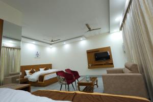 TV i/ili multimedijalni sistem u objektu MST Farm And Resort