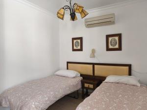 Postel nebo postele na pokoji v ubytování Torremolinos Beach Apartment