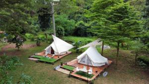 an aerial view of two tents in a field at Umarin Glamping in Amnat Charoen