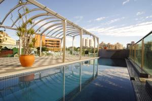 The swimming pool at or close to Astor Metropole Hotel
