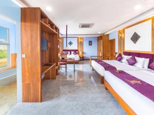Postel nebo postele na pokoji v ubytování Cheata Residence