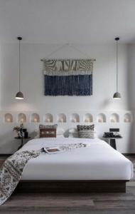 Xishuangbanna Verdant House Resort Hotel 객실 침대