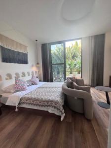 Xishuangbanna Verdant House Resort Hotel 객실 침대