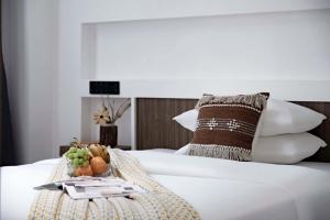 Xishuangbanna Verdant House Resort Hotel 객실 침대