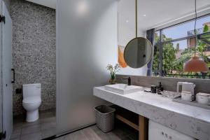 Xishuangbanna Verdant House Resort Hotel 욕실