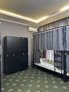Rúm í herbergi á Ultra Hostel