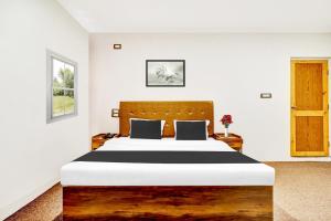 Letto o letti in una camera di Collection O Dal Lake