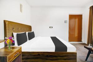 Letto o letti in una camera di Collection O Dal Lake
