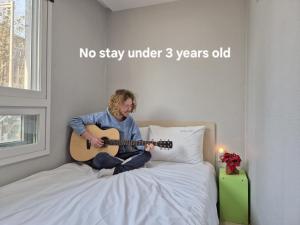 Cama ou camas em um quarto em Hostel Tommy Renewal 2025